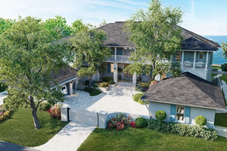 Grande maison élégante entourée de verdure et clôture discrète, image qui illustre l’usage d’un brise-vue de jardin pour préserver l’intimité.