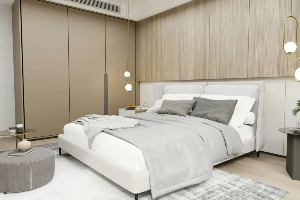 Une chambre élégante avec un lit moderne bien fait, idéale pour aborder la question du symptôme d'une literie trop vieille.